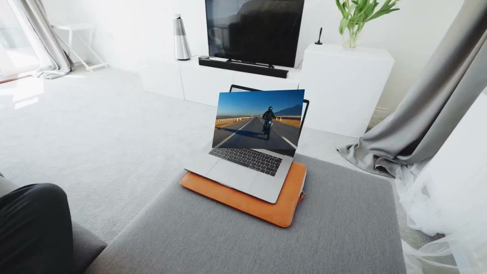 Corner pin: River footage pinned to a laptop screen